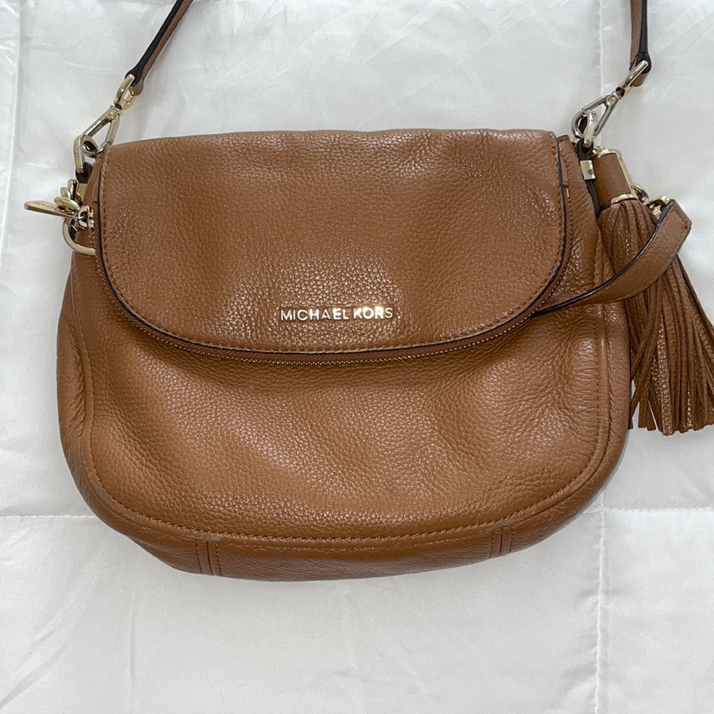Tan Michael Kors shoulder tassel bag